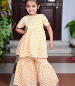 Yellow chevron block printed cotton sharara kurta set with gota embroidery for girl