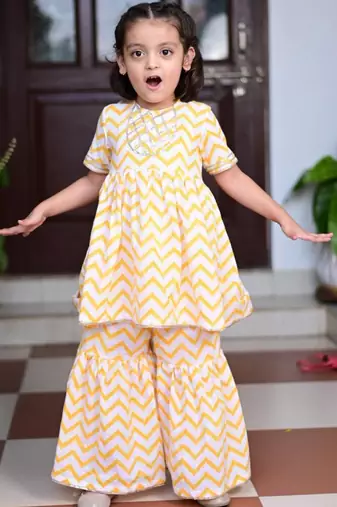 Yellow chevron block printed cotton sharara kurta set with gota embroidery for girl