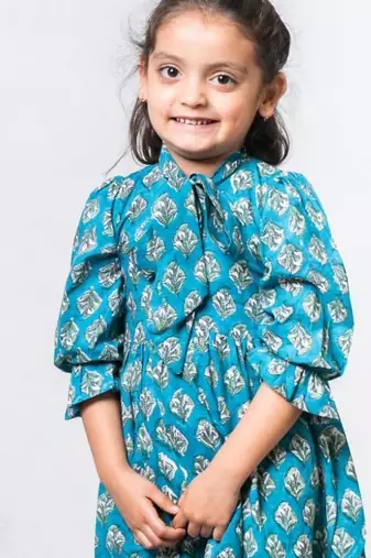 Blue block printed soft cotton long sleeves ruffled knee length dress for girls
