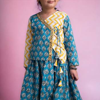 Two piece blue yellow cotton block printed lehenga choli set with frills and tassels for girls 3