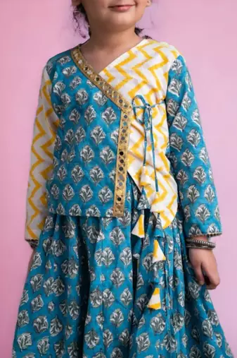 Two piece blue yellow cotton block printed lehenga choli set with frills and tassels for girls