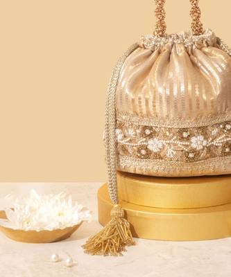 Gold satin embroidered potli bag 2
