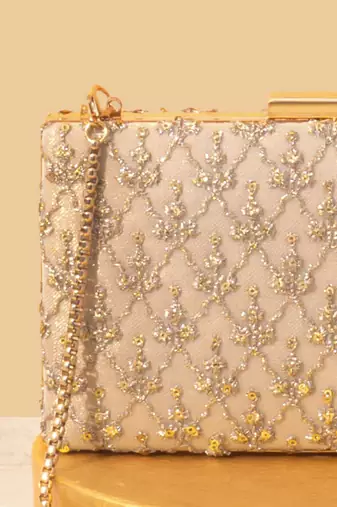 Pink suede embroidered sling bag