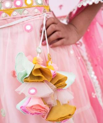 Pink net embroidered lehenga for girls 3
