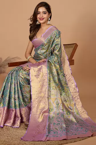 Green woven banarasi design saree with blouse piece