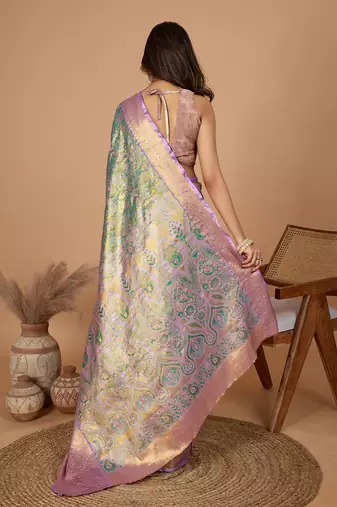 Green woven banarasi design saree with blouse piece