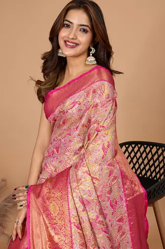 Rani pink woven banarasi design saree with blouse piece