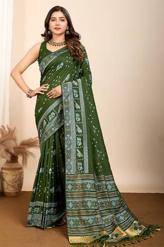Green woven patola saree with blouse piece