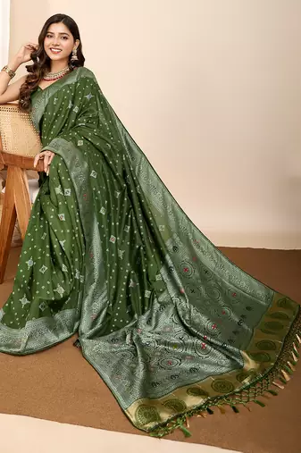 Green woven patola saree with blouse piece