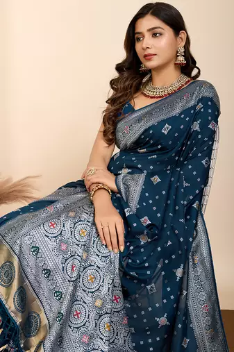 Teal woven patola saree with blouse piece