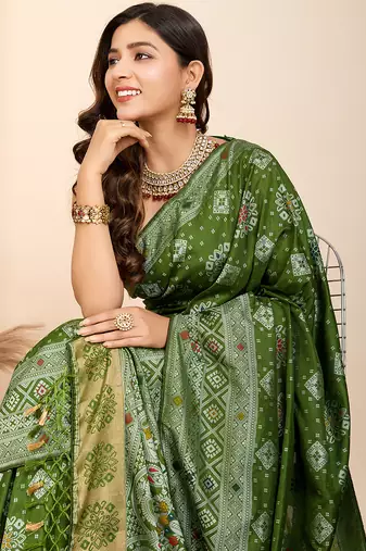 Green woven patola saree with blouse piece
