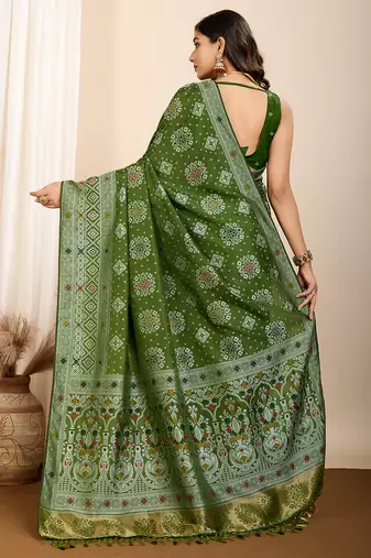 Green woven patola saree with blouse piece