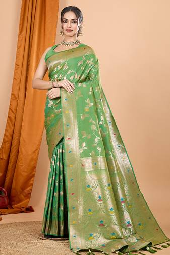 Light green woven banarasi design saree with blouse piece