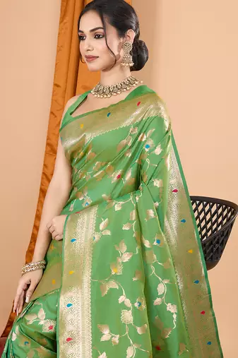 Light green woven banarasi design saree with blouse piece
