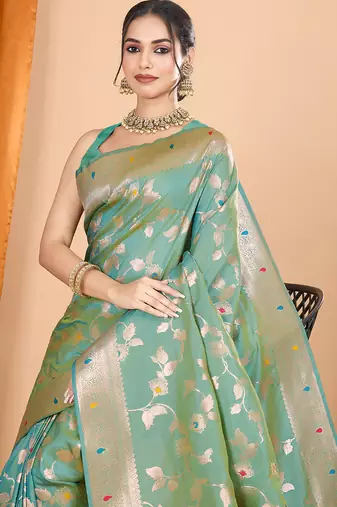 Sea green woven banarasi design saree with blouse piece