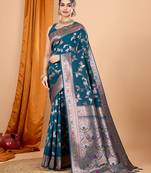 Teal woven banarasi design saree with blouse piece