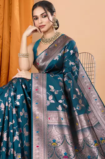 Teal woven banarasi design saree with blouse piece