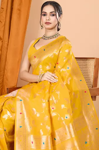 Yellow woven banarasi design saree with blouse piece