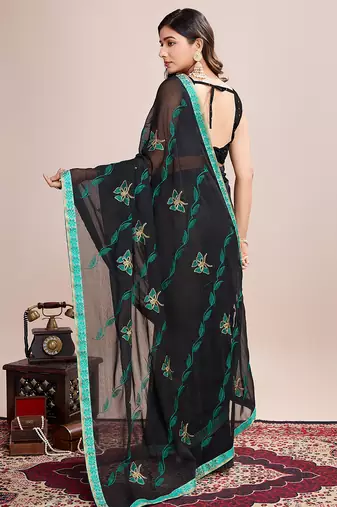 Green embroidered georgette saree with blouse piece
