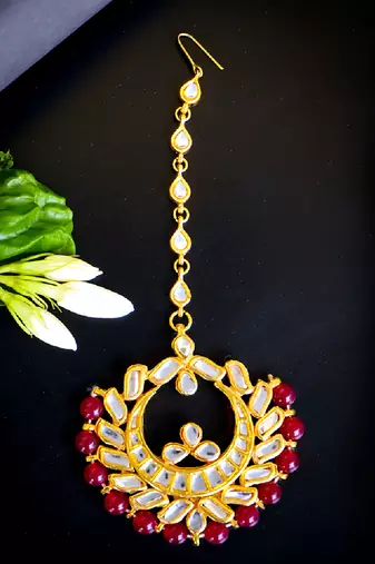   regal kundan chandbali maang tikka with ruby beads