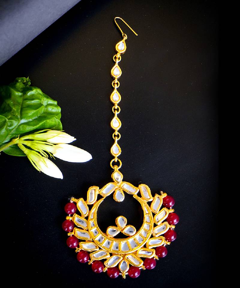   regal kundan chandbali maang tikka with ruby beads
