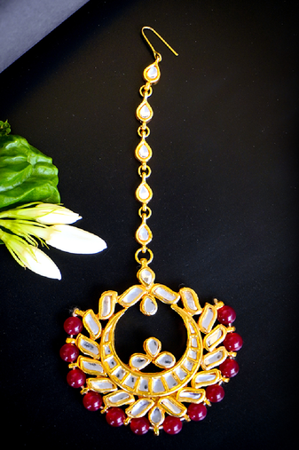   regal kundan chandbali maang tikka with ruby beads
