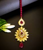 Luxurious floral kundan maang tikka with ruby accents