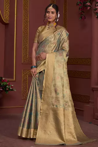 teal traditional prints art silk woven saree comes with matching blouse
