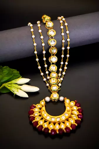 Royal crescent kundan maang tikka with ruby bead detailing