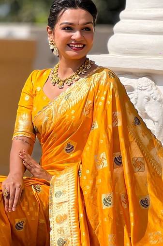 Yellow Swastik and Kalash Design Dola silk blend Saree