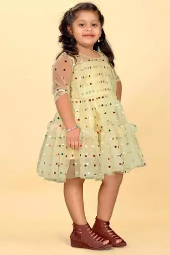 Yellow net printed sequins work frock for girls