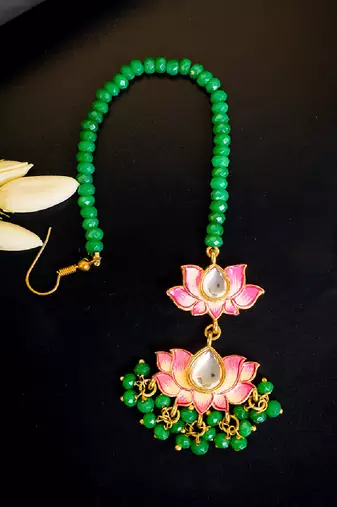 Pink lotus kundan maang tikka with green bead detailing