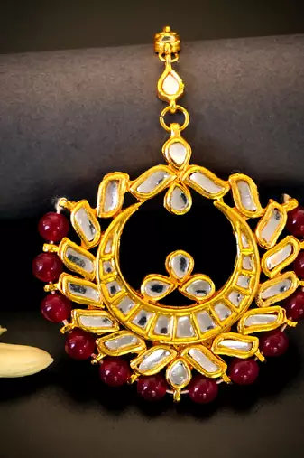   regal kundan chandbali maang tikka with ruby beads