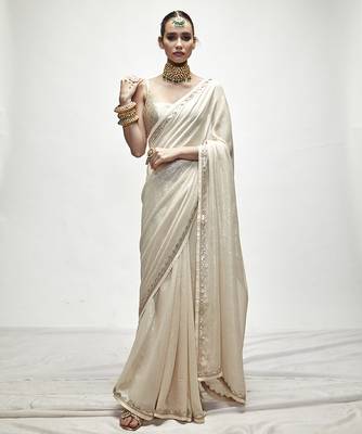 Cream georgette plain saree 1