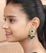 Elegant drop earrings with intricate stone and pearl detailing