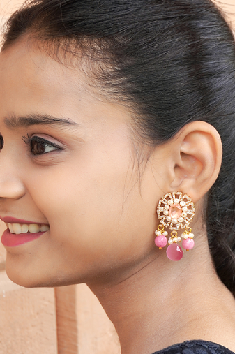 Elegant drop earrings with intricate stone and pearl detailing