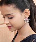 Floral-inspired stud earrings with teardrop centerpiece and pearl accents
