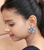 Statement floral stud earrings with pave detailing