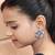Statement floral stud earrings with pave detailing