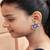 Statement floral stud earrings with pave detailing