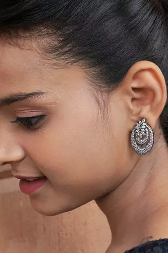 Elegant oval floral studded earrings