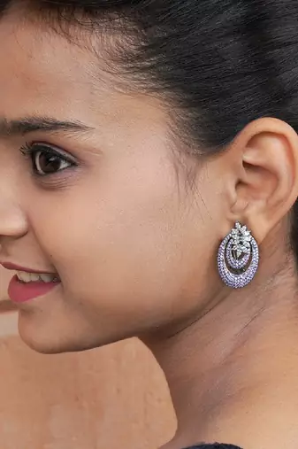 Elegant oval floral studded earrings