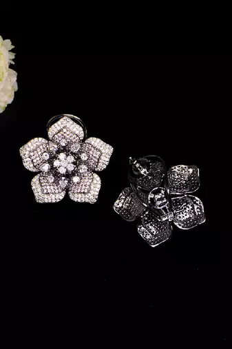 Statement floral stud earrings with pave detailing