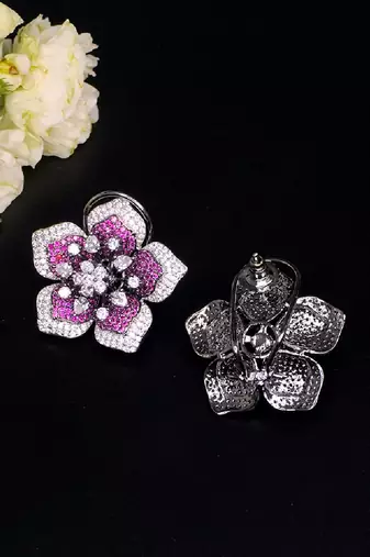Statement floral stud earrings with pave detailing