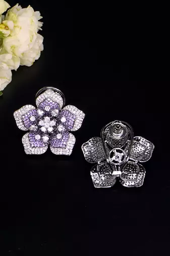 Statement floral stud earrings with pave detailing