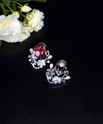 Floral-inspired stud earrings with teardrop centerpiece and pearl accents 2