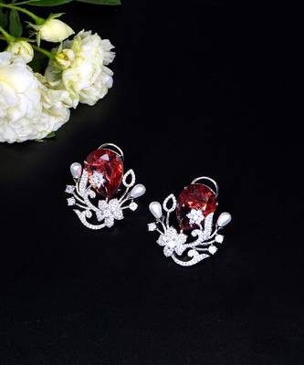 Floral-inspired stud earrings with teardrop centerpiece and pearl accents 4