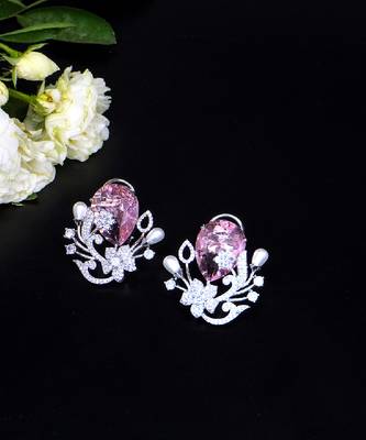 Floral-inspired stud earrings with teardrop centerpiece and pearl accents 2