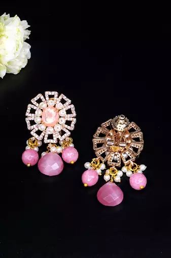 Elegant drop earrings with intricate stone and pearl detailing