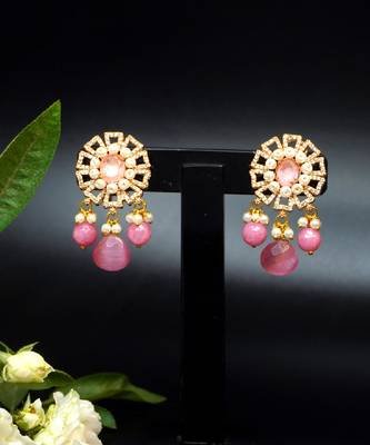 Elegant drop earrings with intricate stone and pearl detailing 3